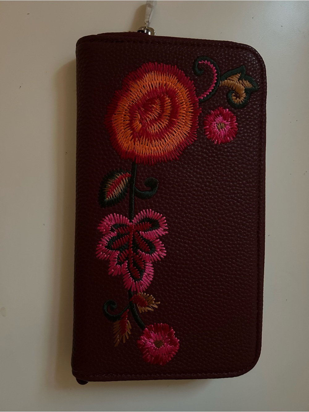Burgundy floral wallet with embroidered flowers